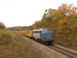  V 170 1125 am 26.10.2004 mit dem Schotterreinigungszug, kurz vor Syren bei der Arbeit